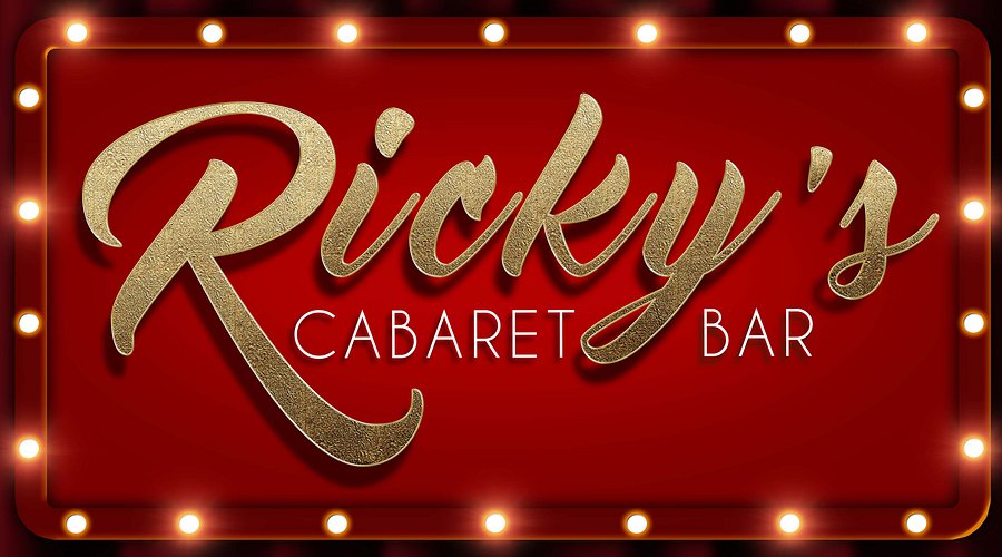 Sign of Ricky's Cabaret Bar Gran Canaria with a red background and gold lettering, surrounded by light bulbs.